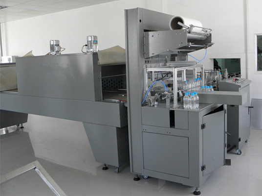 Shrink Film Packaging Machine untuk Water Packaging Plant Shrink Wrap Machine CE ISO